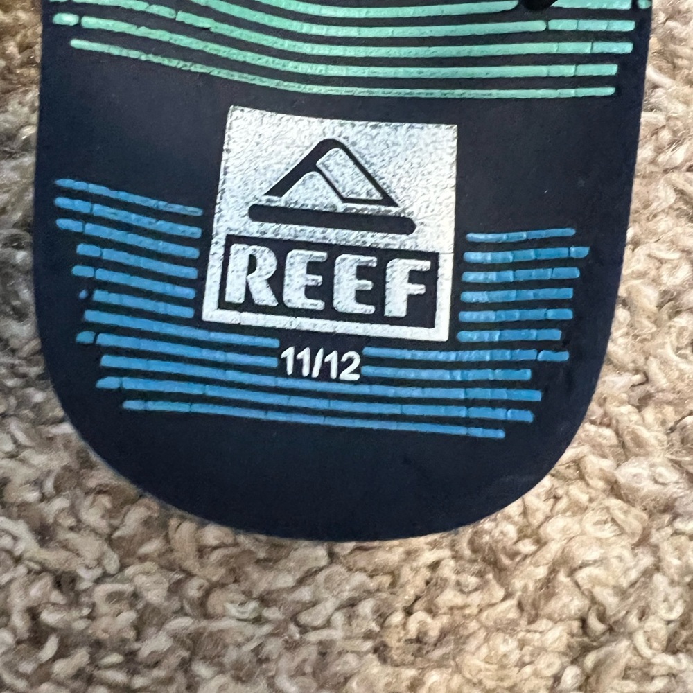Reef Blue and Black Flip Flops with Striped Design - Picture 2 of 3